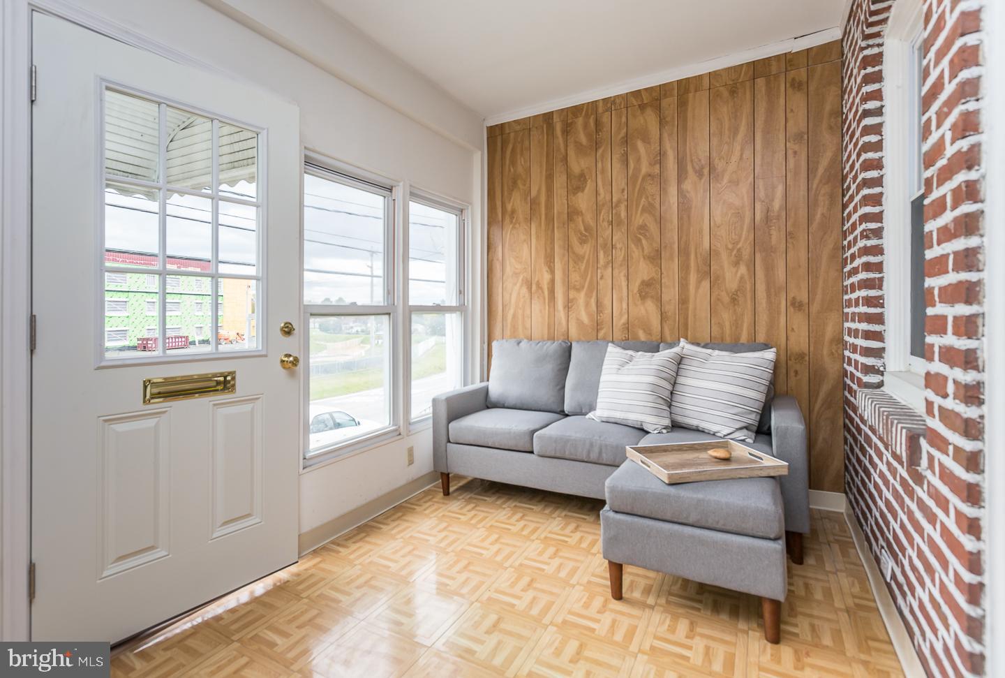 1469 Lawrence Road Havertown, PA 19083 - Photo 5 of 23 a living room with furniture and a window