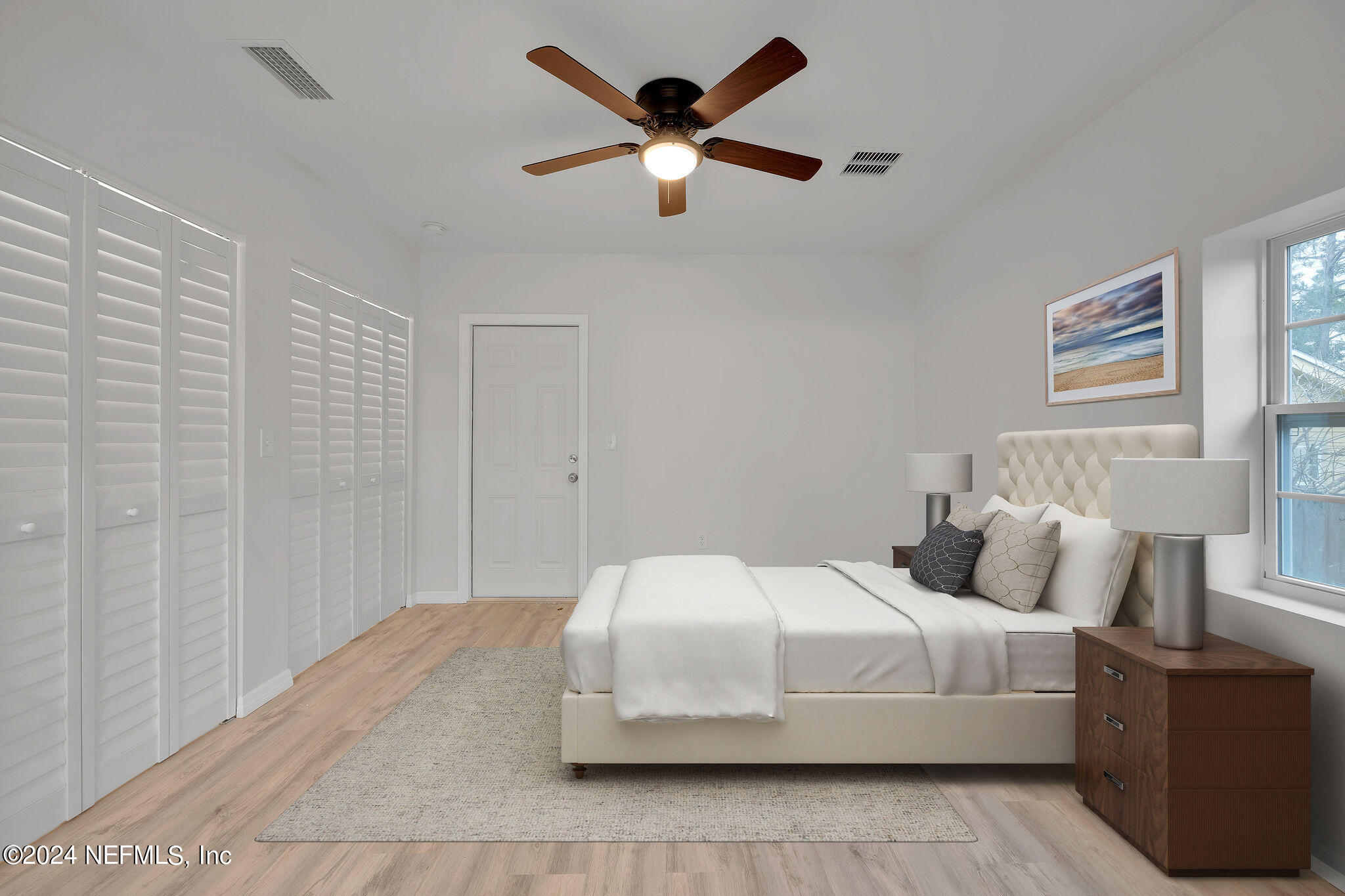 7519 Birdies Road Jacksonville, FL 32256 - Photo 18 of 24 a bedroom with a bed and window