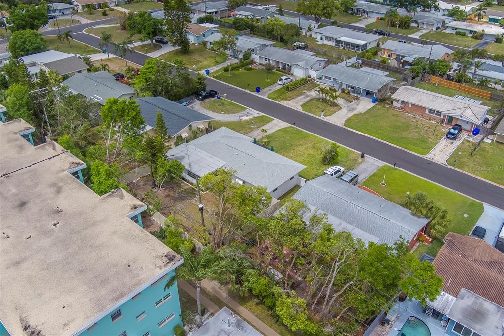 11424 79th Avenue Seminole, FL 33772 - Photo 53 of 62 an aerial view of residential houses with outdoor space