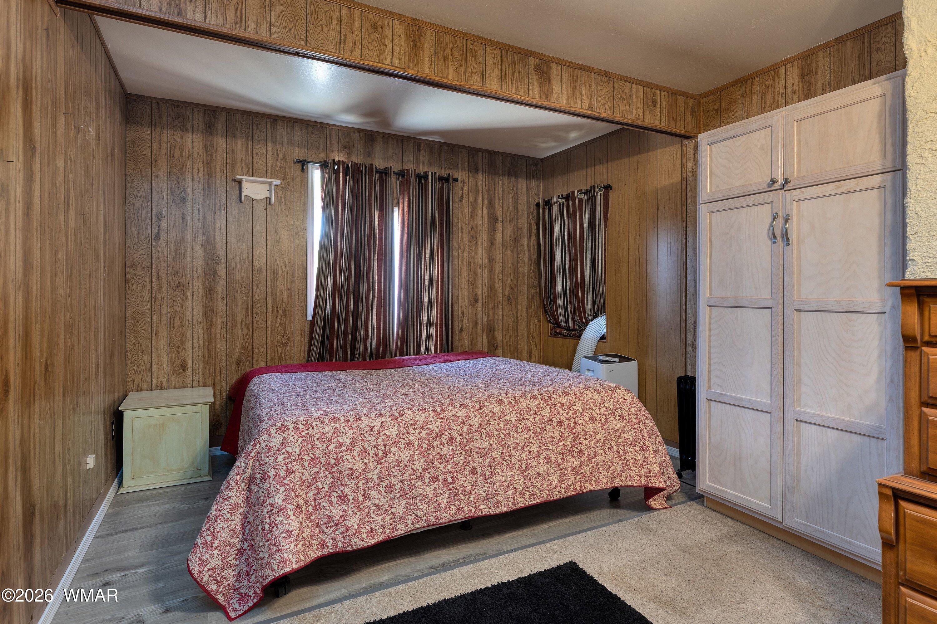 1114 Ranch Road Taylor, AZ 85939 - Photo 23 of 32 a bedroom with a bed and a refrigerator