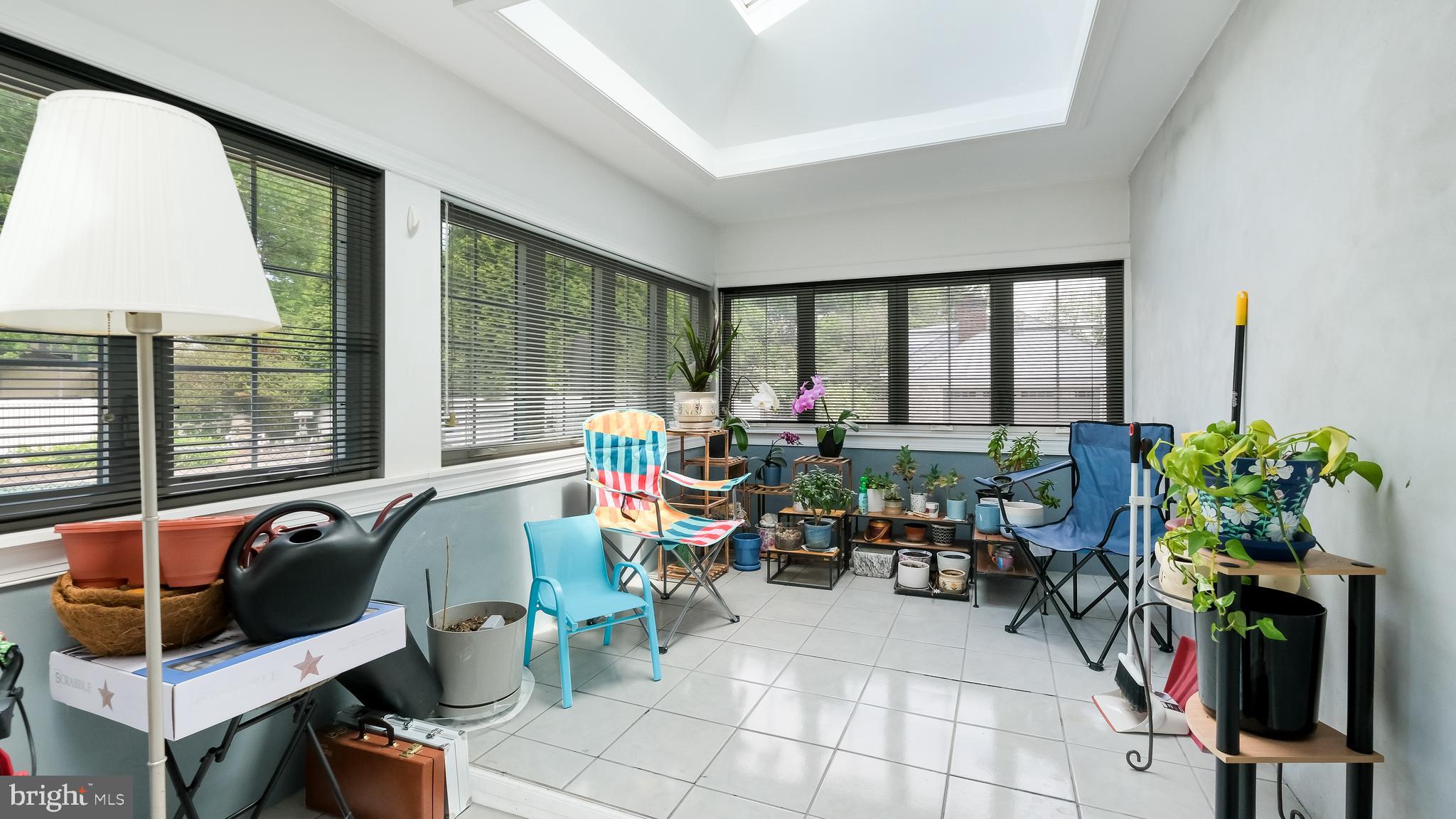 1061 George Road Jenkintown, PA 19046 - Photo 14 of 36 Sunroom with skylight and views of the backyard