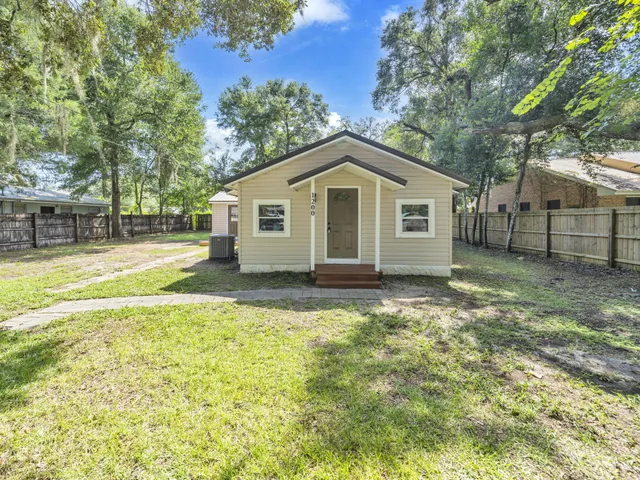 a house view with a garden space