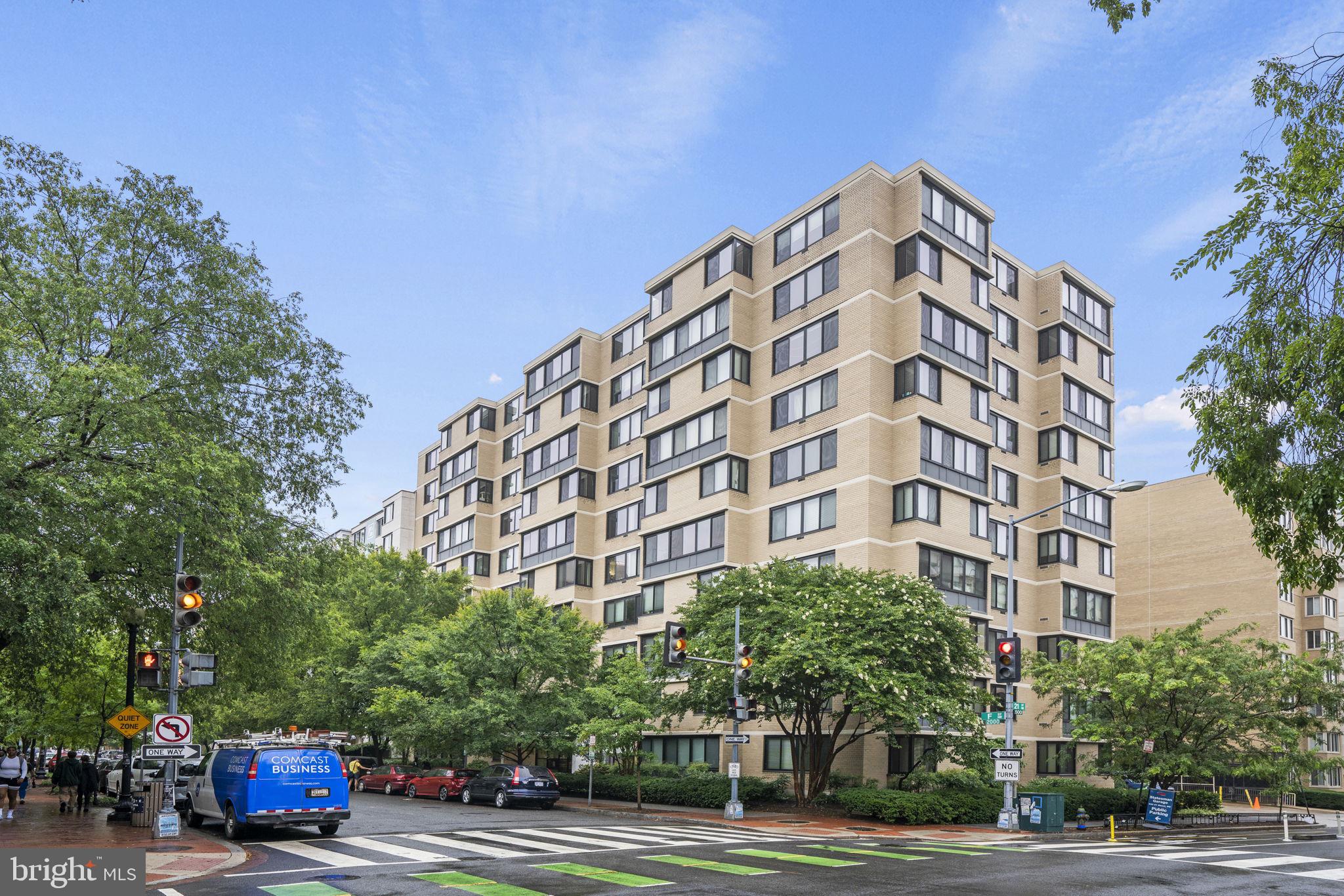 2030 F Street Northwest, Unit 606 Washington, DC 20006 - Photo 13 of 14 a view of a tall building next to a road