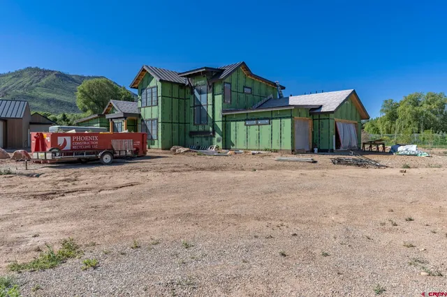 a car parked in front of a house