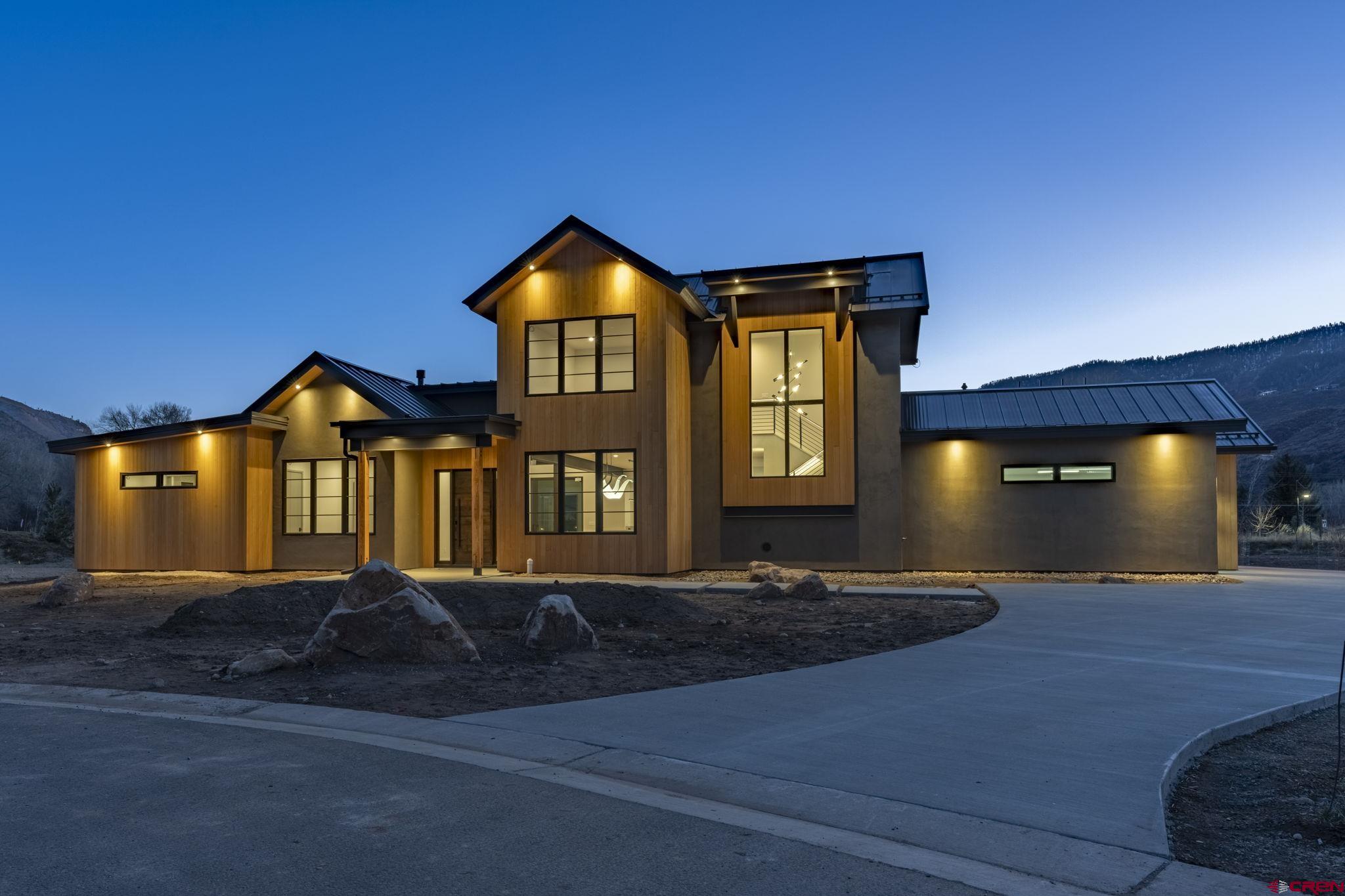 102 Elkview Court Durango, CO 81301 - Photo 2 of 45 a front view of a house with a yard