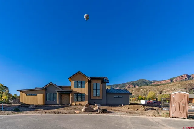 a house view with a garden space