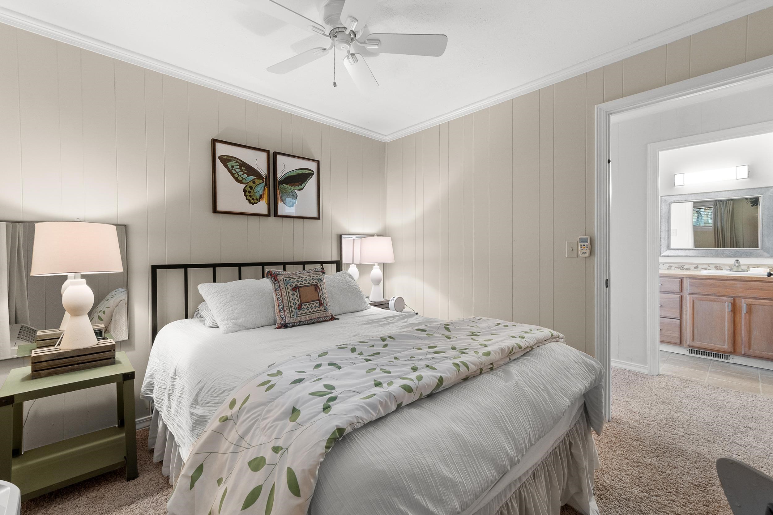 11 Cr 452 Road Iuka, MS 38852 - Photo 25 of 37 a bedroom with a bed and a chandelier
