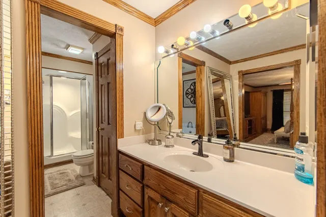 a bathroom with a sink double vanity and a mirror