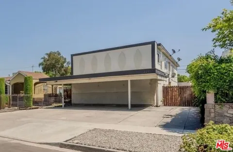 a front view of a house with a garage
