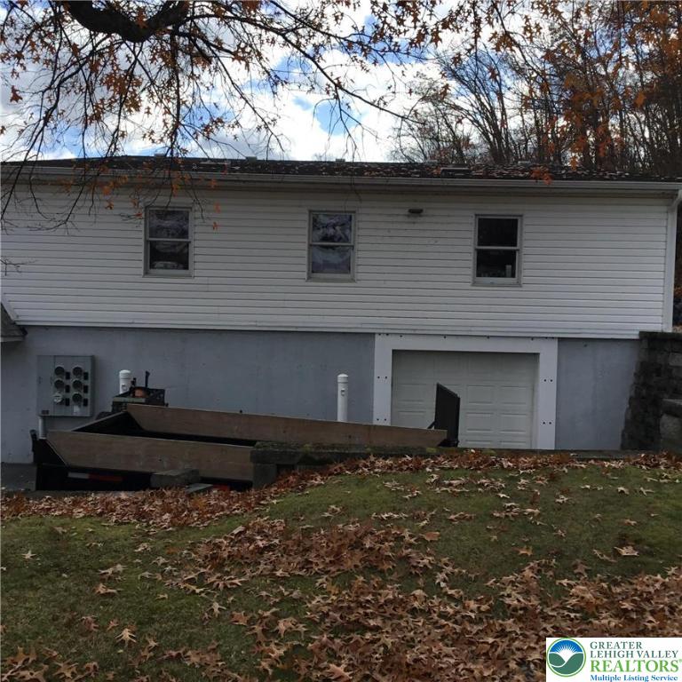 7954 Highway 873 Slatington, PA 18080 - Photo 19 of 26 a front view of a house with garage