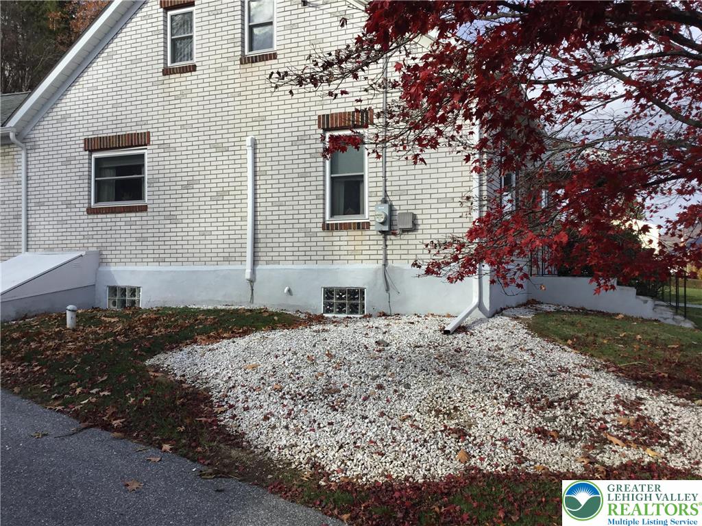 7954 Highway 873 Slatington, PA 18080 - Photo 23 of 26 a front view of a house with a yard