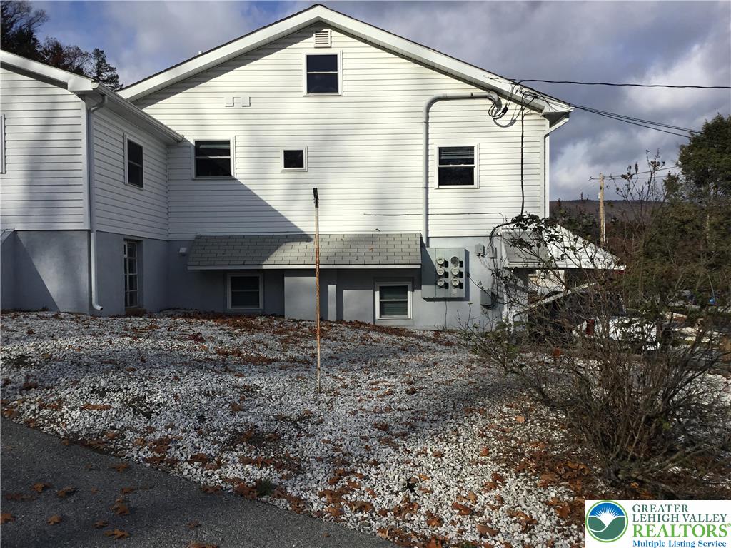7954 Highway 873 Slatington, PA 18080 - Photo 7 of 26 a view of a house with a yard
