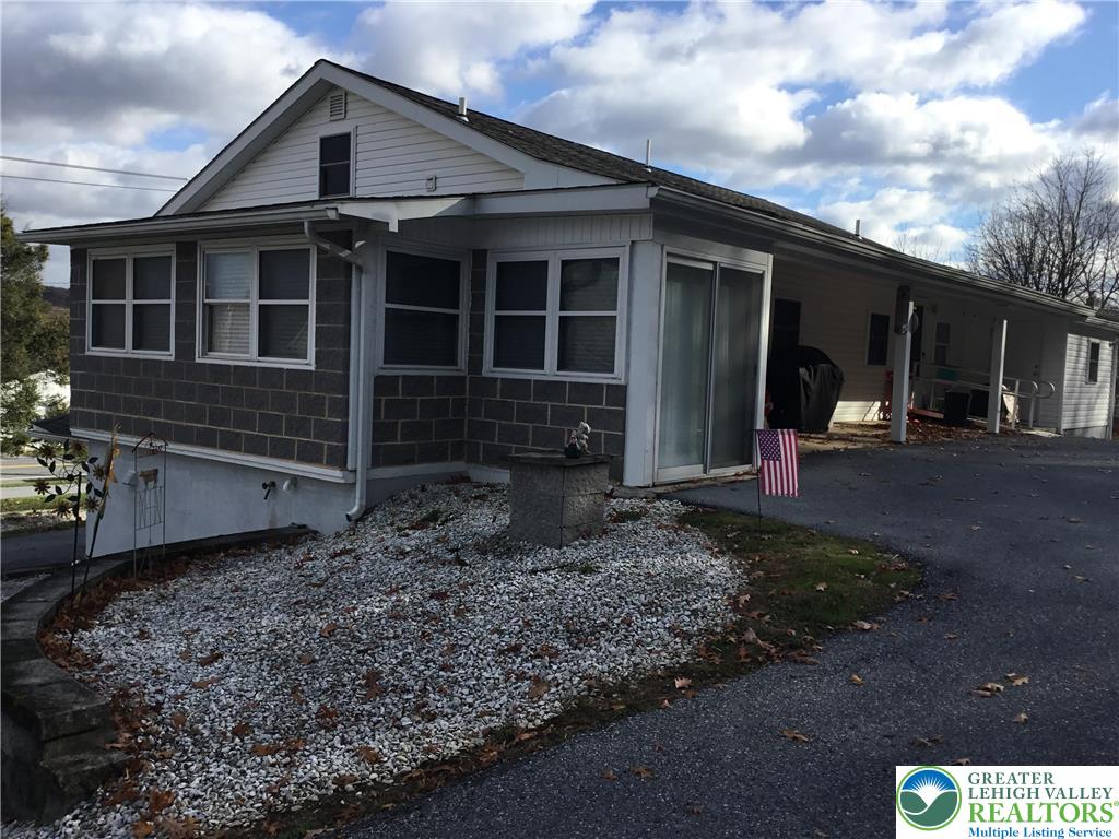7954 Highway 873 Slatington, PA 18080 - Photo 9 of 26 a front view of a house with garden