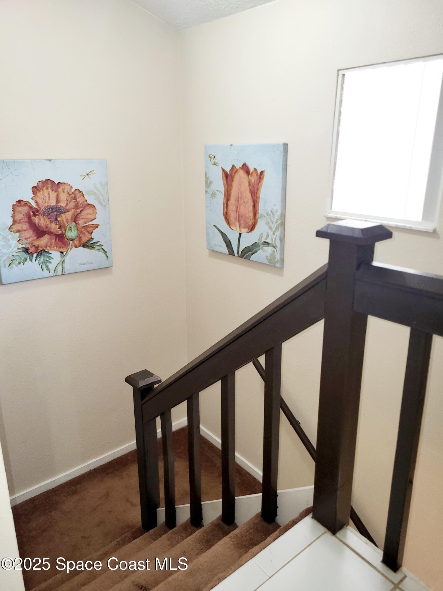 145 Augusta Way Melbourne, FL 32940 - Photo 19 of 28 a picture of a bench in a room