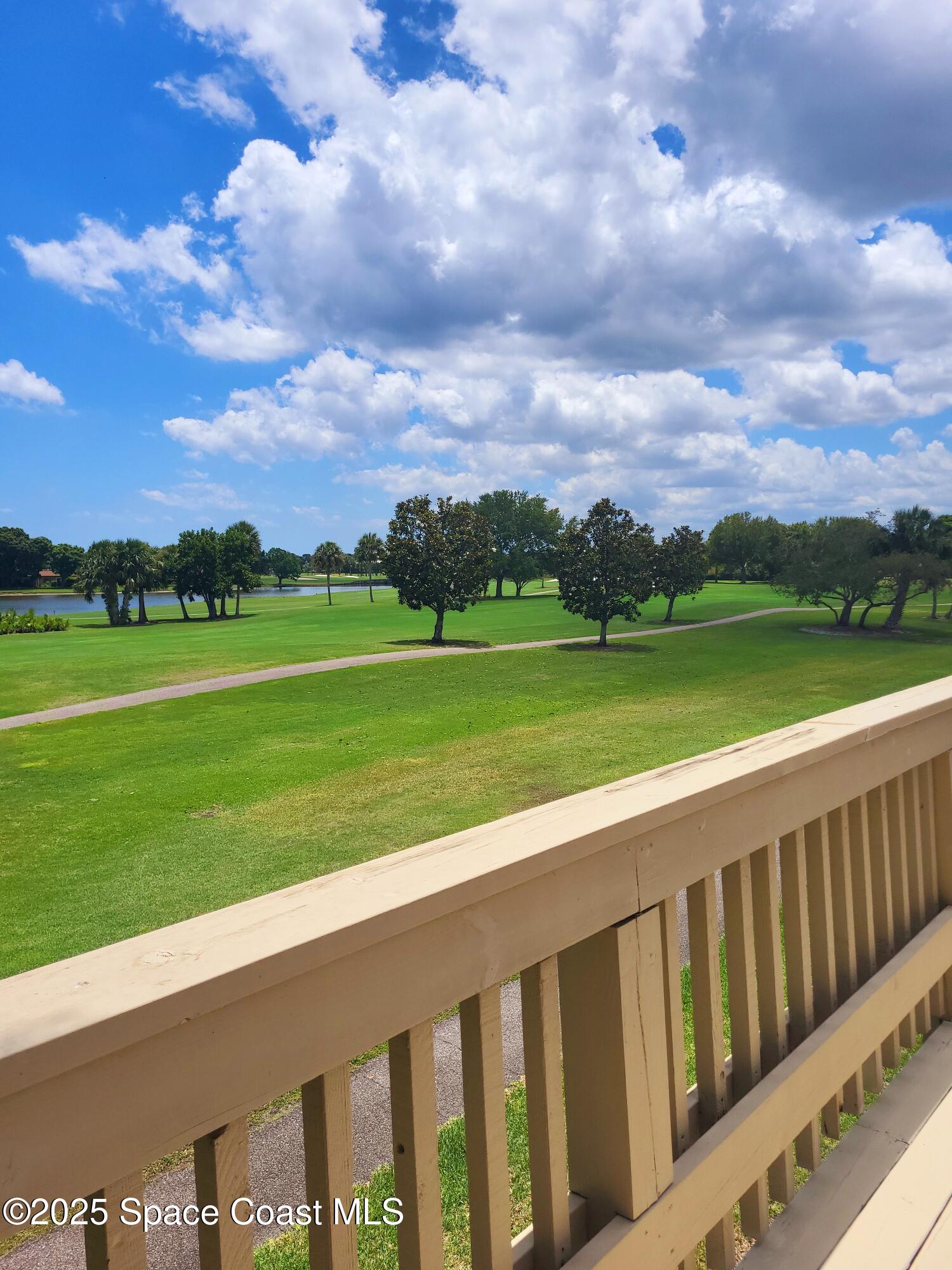 145 Augusta Way Melbourne, FL 32940 - Photo 28 of 28 a view of a golf course with a garden