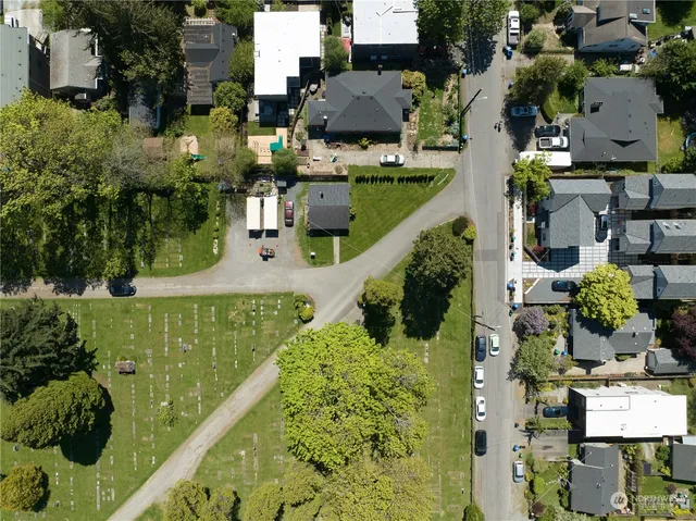 an aerial view of houses with outdoor space