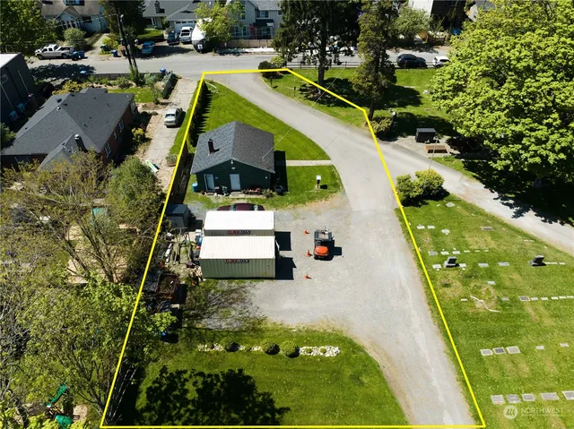 an aerial view of residential house with pool