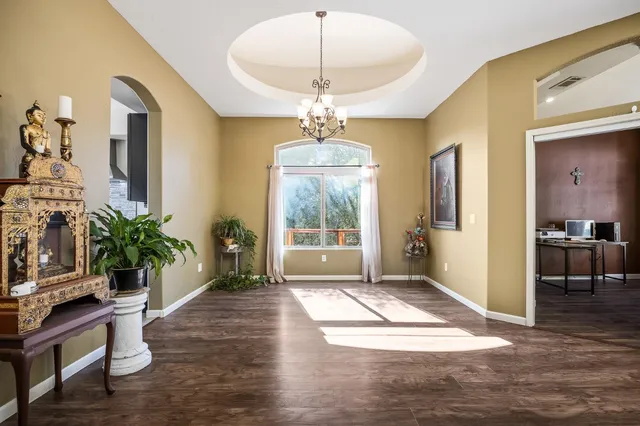 a view of a hallway view with staircase