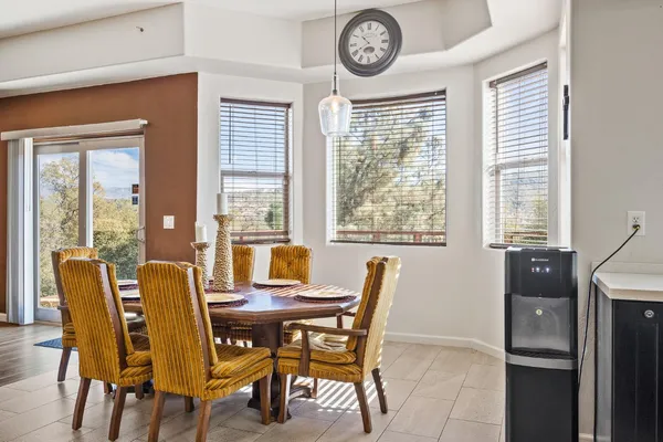 a kitchen with granite countertop a refrigerator and a stove