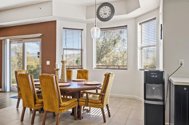 a kitchen with granite countertop a refrigerator and a stove