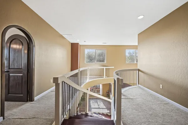 a bathroom with 2 sink and a mirror