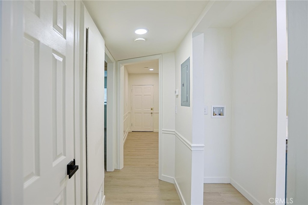 4109 West 5th Street, Unit F2 Santa Ana, CA 92703 - Photo 27 of 41 a bathroom with a shower and a glass door