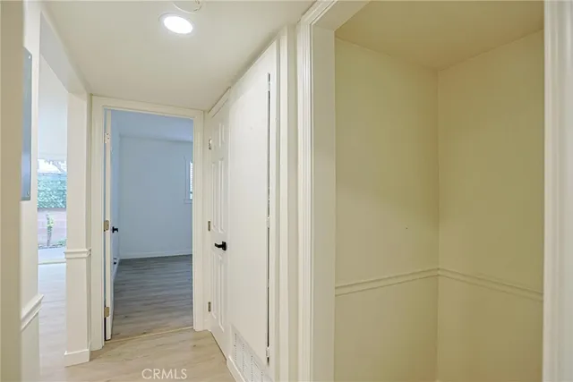 a view of a backyard with chair and table
