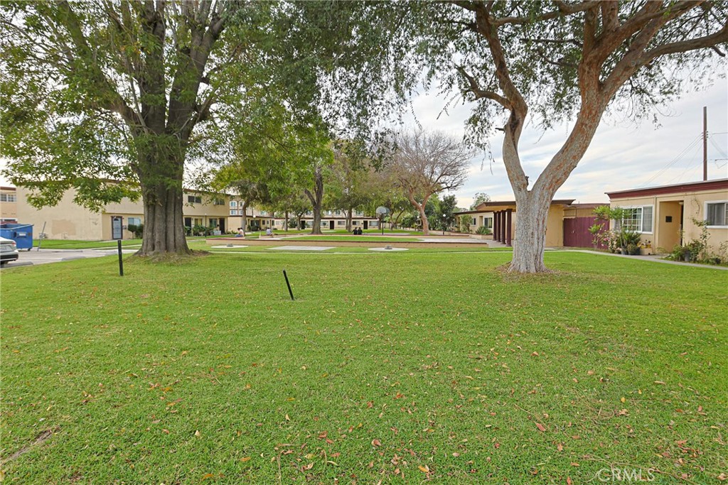 4109 West 5th Street, Unit F2 Santa Ana, CA 92703 - Photo 39 of 41 a view of a trees in front of a house