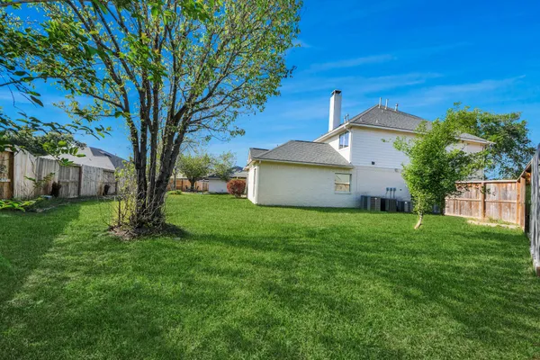 a house view with a garden space