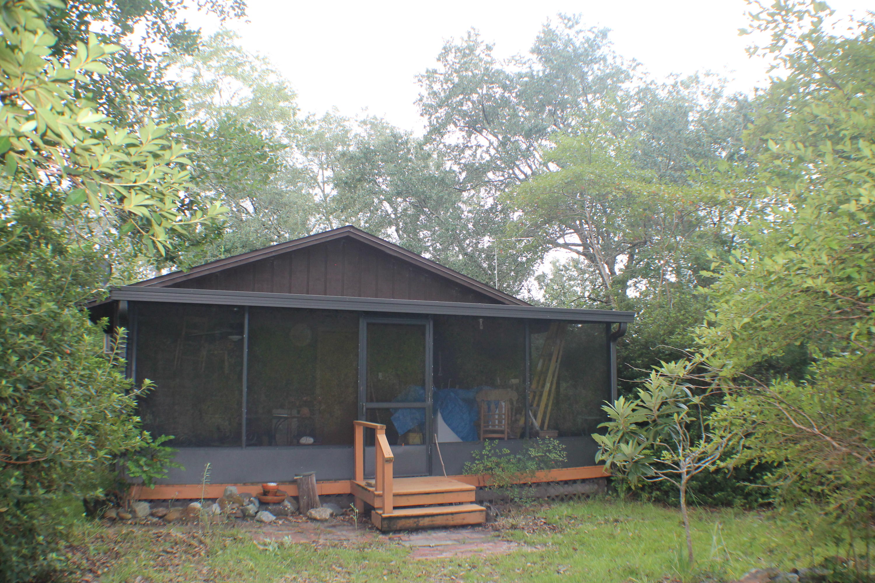 1875 Middle Creek Road Wing, AL 36483 - Photo 1 of 24 a front view of a house with garden