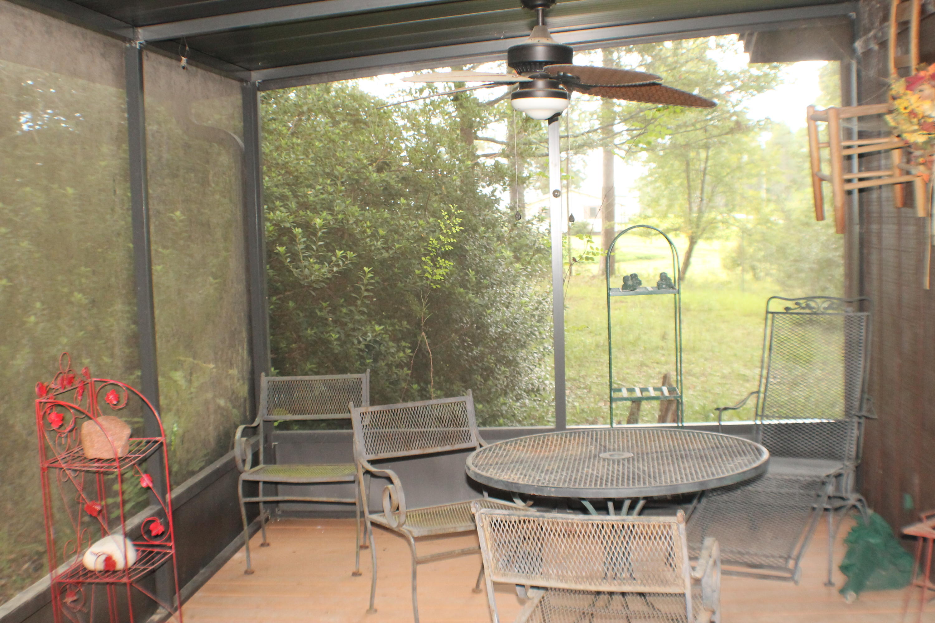 1875 Middle Creek Road Wing, AL 36483 - Photo 2 of 24 a view of a room with table and chairs