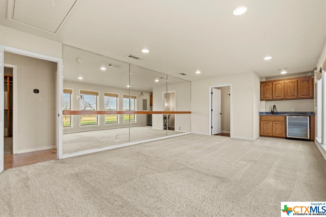 6503 Wells Fargo Road Killeen, TX 76542 - Photo 26 of 48 a view of an empty room with a kitchen