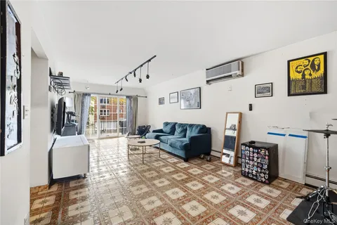 a bedroom with a bed and chair