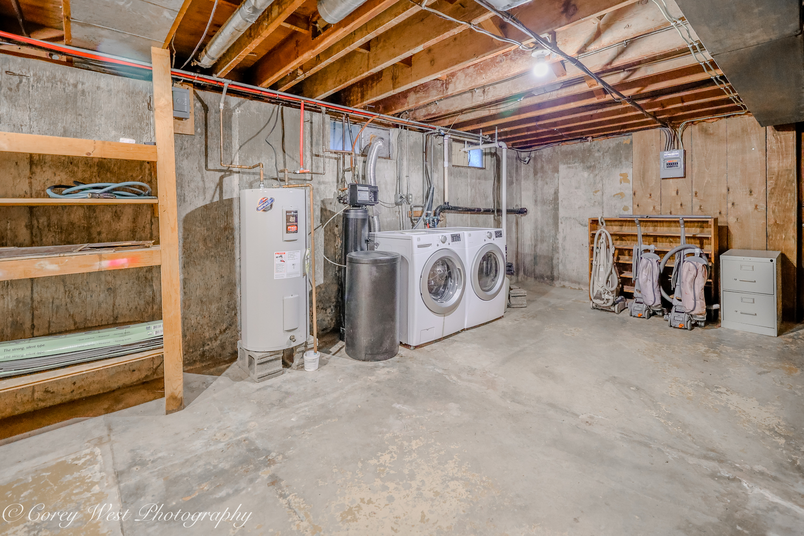 8994 Highway 64 Sycamore, IL 60178 - Photo 32 of 37 a view of a storage room with washer and dryer