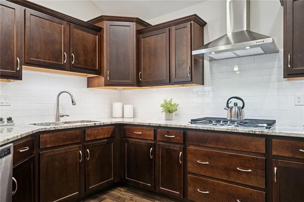 336 Saddlebrook Road Gibsonia, PA 15044 - Photo 12 of 35 a kitchen with granite countertop a sink stainless steel appliances and cabinets