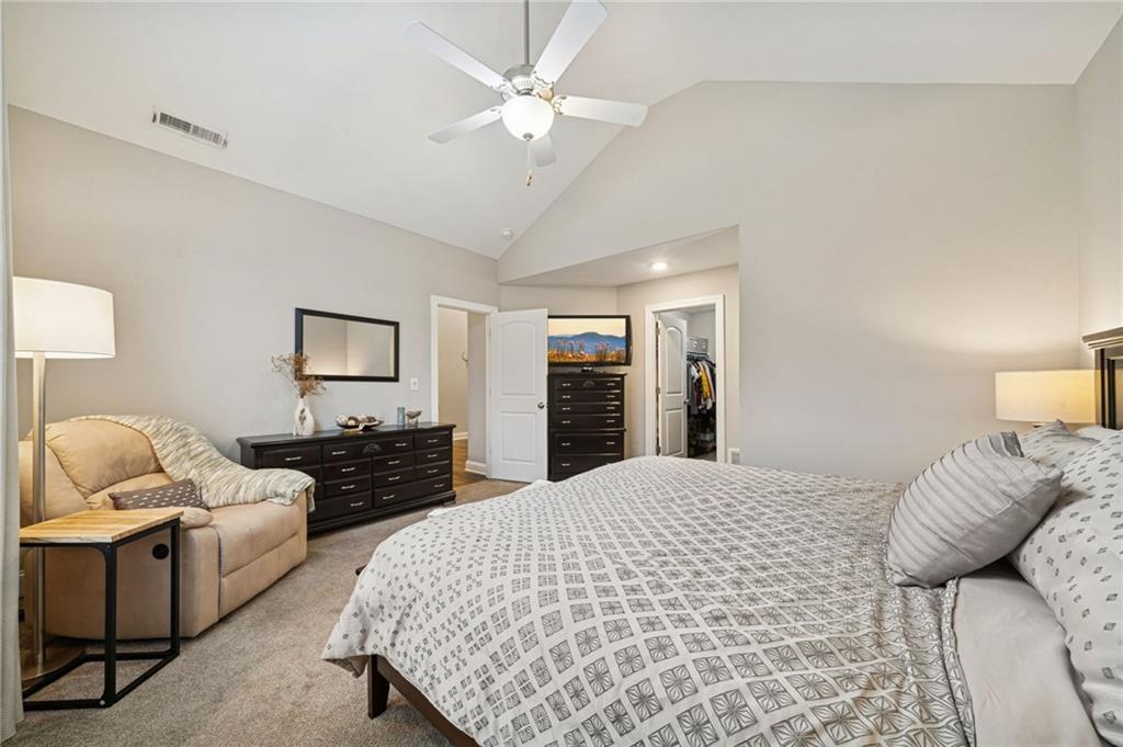 336 Saddlebrook Road Gibsonia, PA 15044 - Photo 24 of 35 a bedroom with bed and a chandelier