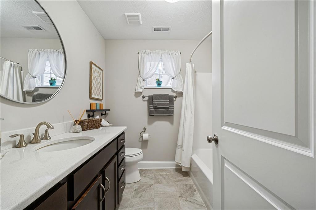 336 Saddlebrook Road Gibsonia, PA 15044 - Photo 30 of 35 a bathroom with a sink a toilet and shower