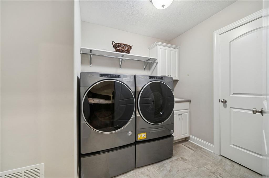 336 Saddlebrook Road Gibsonia, PA 15044 - Photo 31 of 35 a utility room with dryer and washer