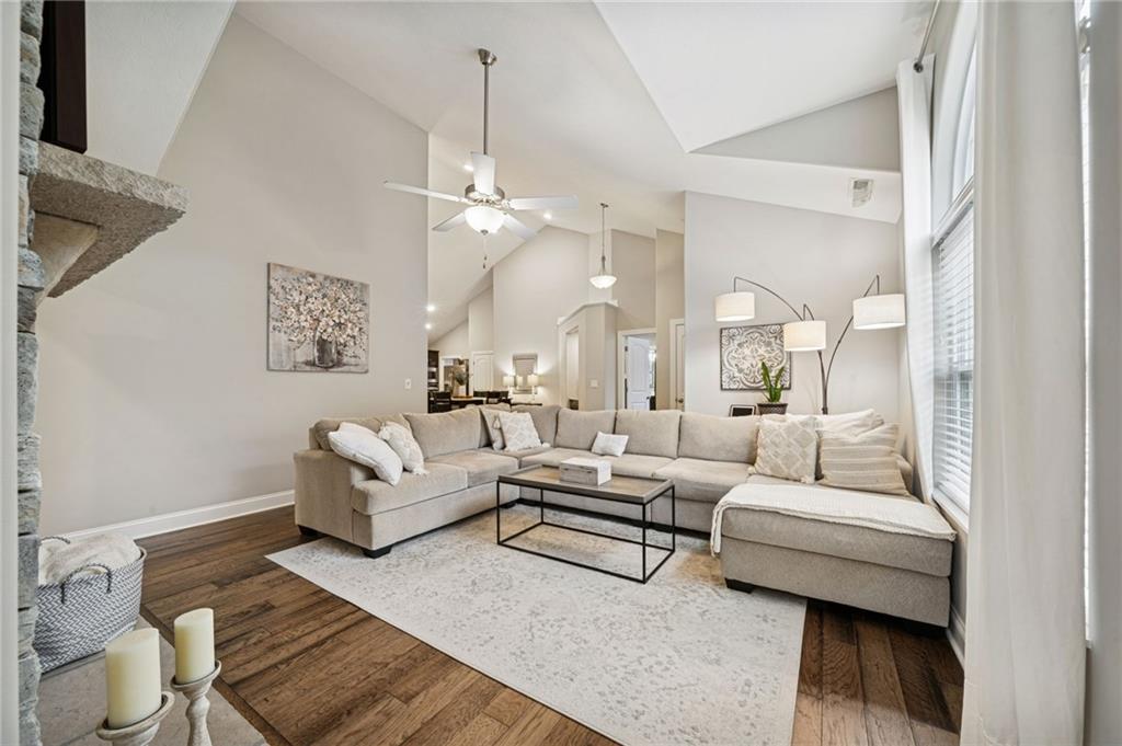 336 Saddlebrook Road Gibsonia, PA 15044 - Photo 9 of 35 a living room with furniture and a chandelier