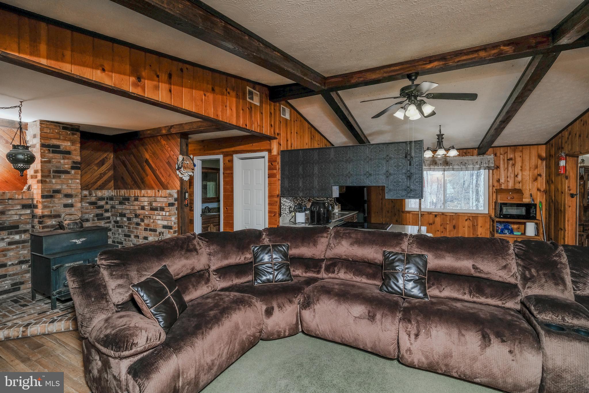 4762 Cold Run Valley Road Berkeley Springs, WV 25411 - Photo 34 of 47 Family Room with Wood Stove