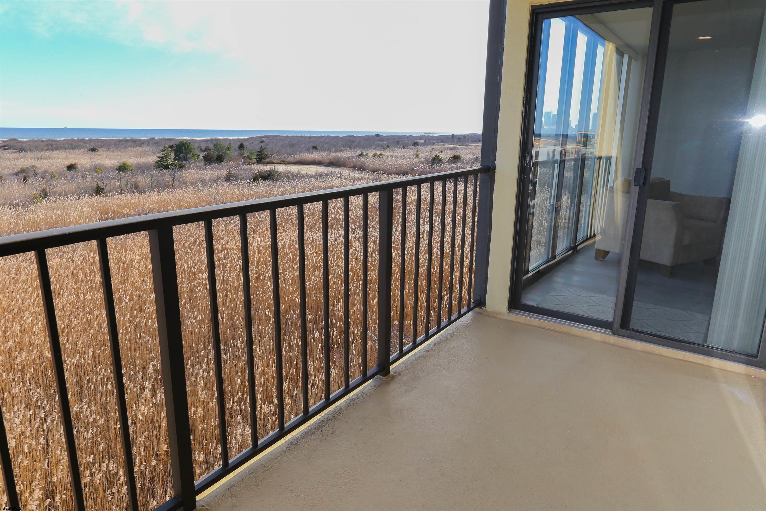 4540 West Brigantine Avenue, Unit N408 Brigantine, NJ 08203 - Photo 23 of 42 a view of balcony with wooden floor