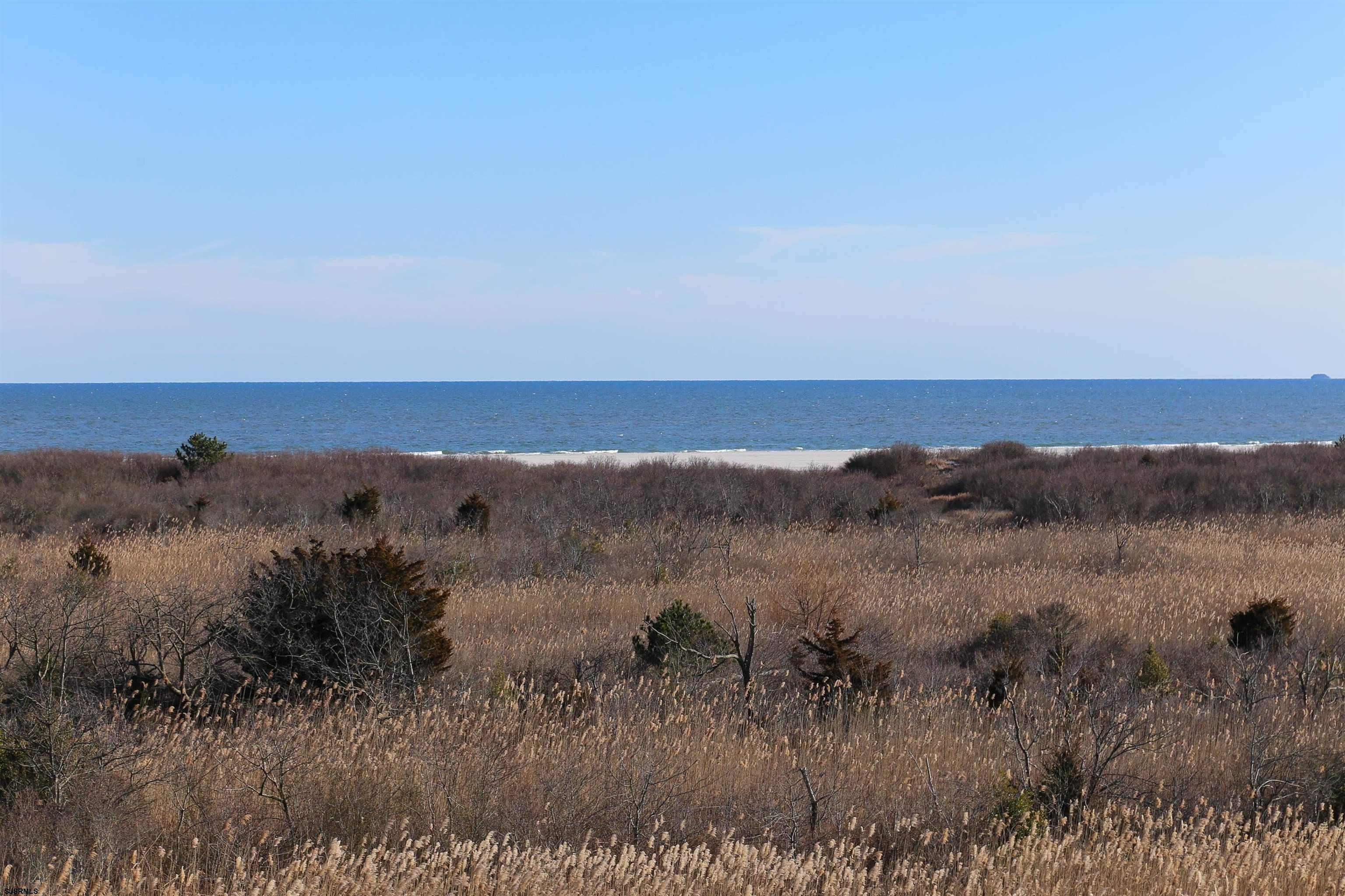 4540 West Brigantine Avenue, Unit N408 Brigantine, NJ 08203 - Photo 26 of 42 an aerial view of mountain with beach