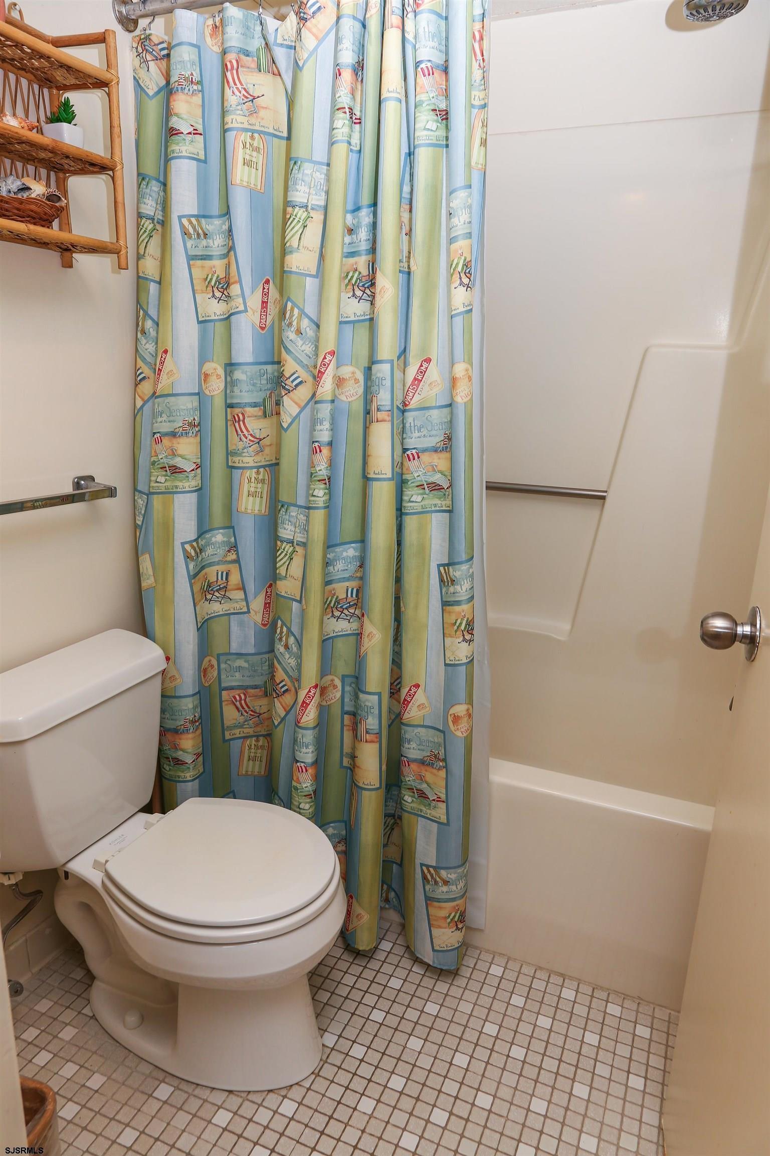 4540 West Brigantine Avenue, Unit N408 Brigantine, NJ 08203 - Photo 34 of 42 a bathroom with a toilet and shower