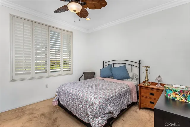 a bedroom with a bed and furniture