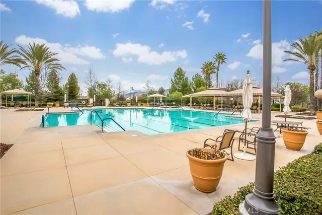 a view of an outdoor space pool patio and mountain view