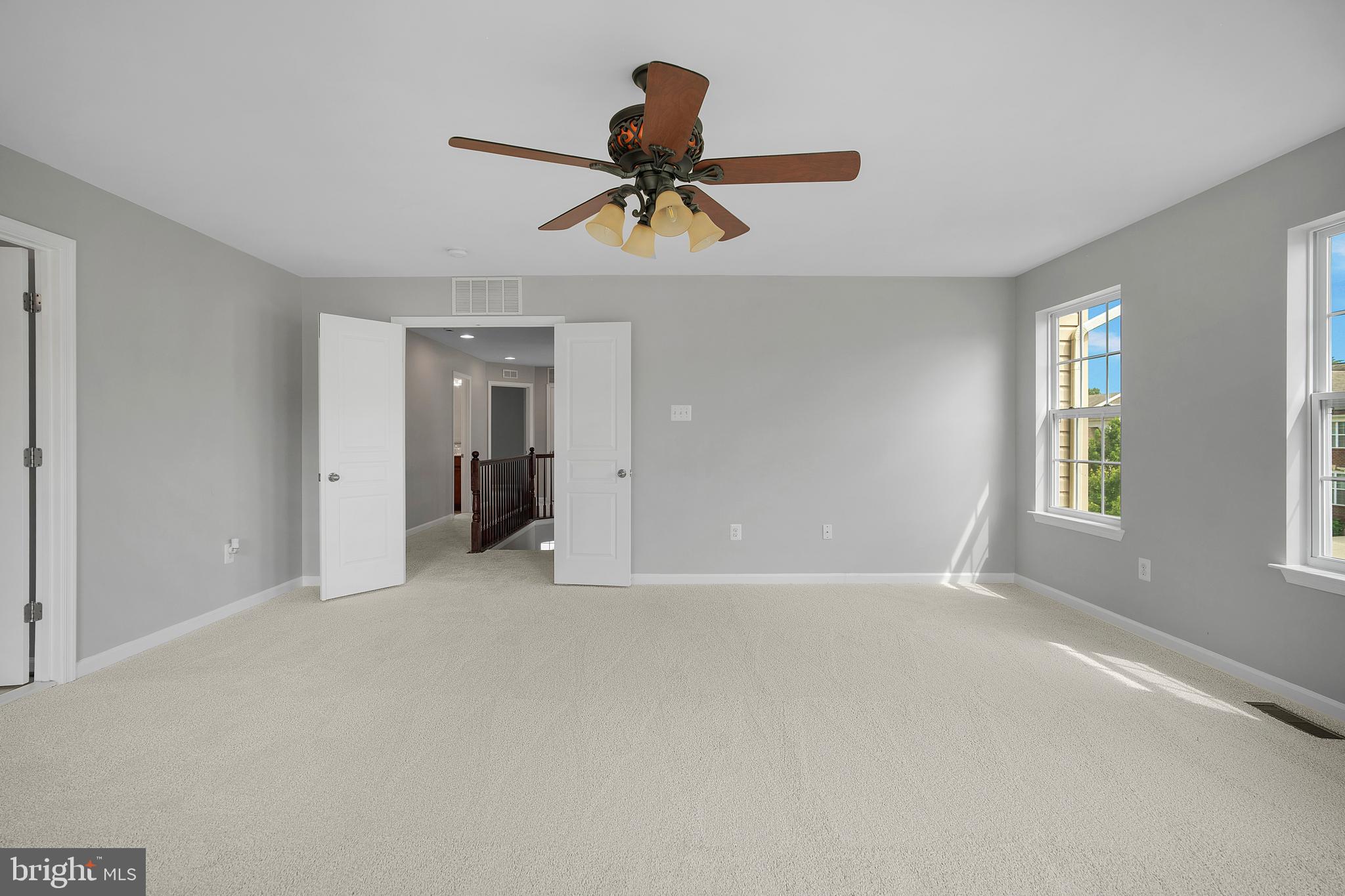 8205 Running Spring Circle Severn, MD 21144 - Photo 45 of 77 a view of an empty room with a window