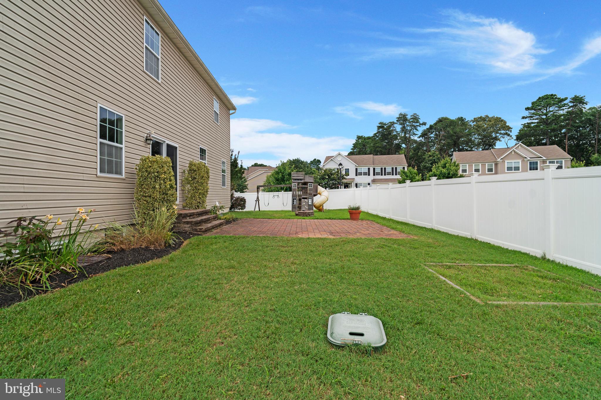 8205 Running Spring Circle Severn, MD 21144 - Photo 73 of 77 a view of a house with a backyard and a tree