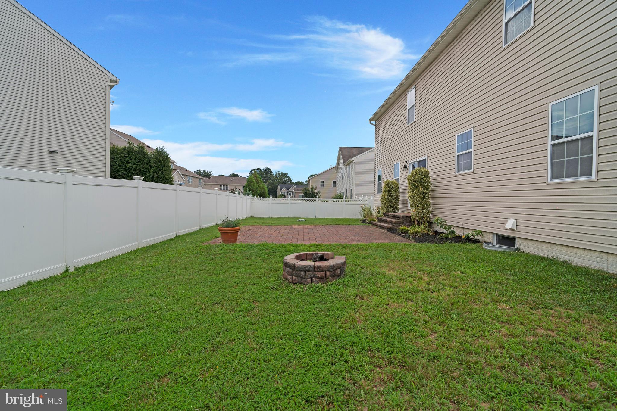 8205 Running Spring Circle Severn, MD 21144 - Photo 76 of 77 a view of a backyard with plants and a garden