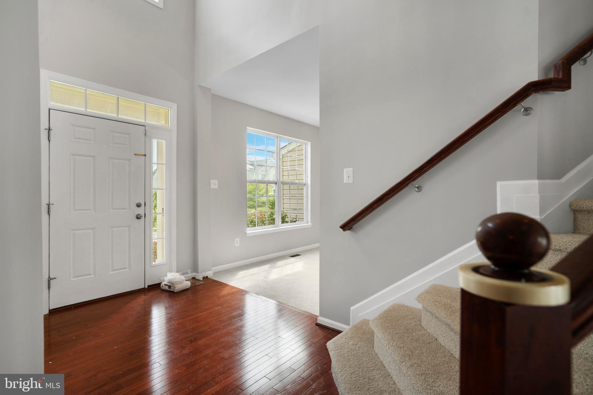 8205 Running Spring Circle Severn, MD 21144 - Photo 9 of 77 a view of entryway and hall with wooden floor
