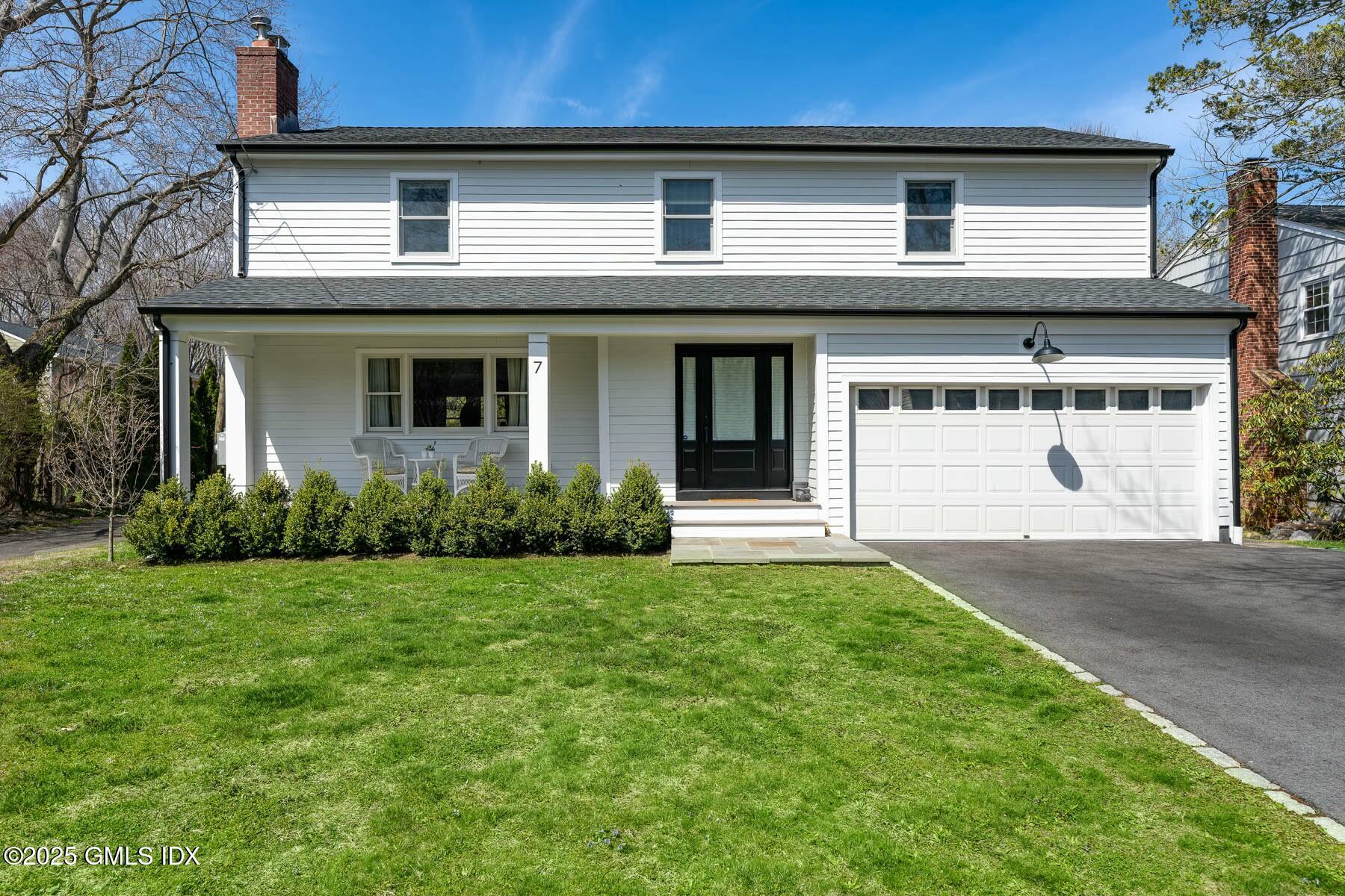 7 Griffith Road Riverside, CT 06878 - Photo 1 of 30 a front view of a house with garden